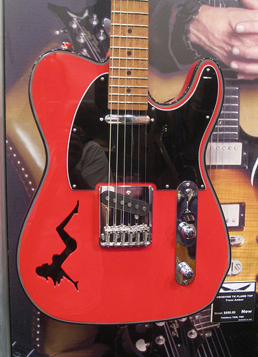 Dean semi-hollowbody guitar with mud flap cutout
